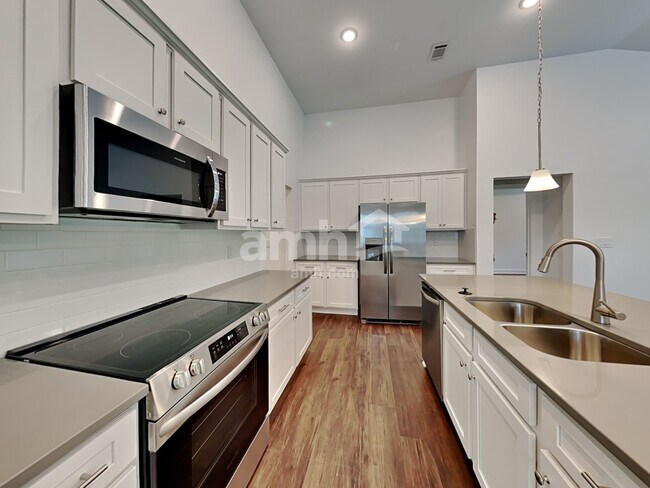 Foto del edificio - 5036 Pebble Bridge Way
