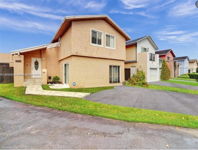 Foto del edificio - 4 br, 3 bath House - 1007 NW 106th Avenue Cir