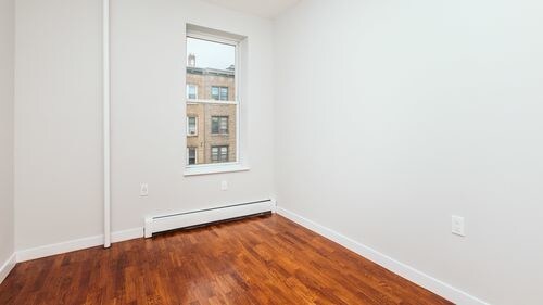 Building Photo - 61-32 Woodbine St