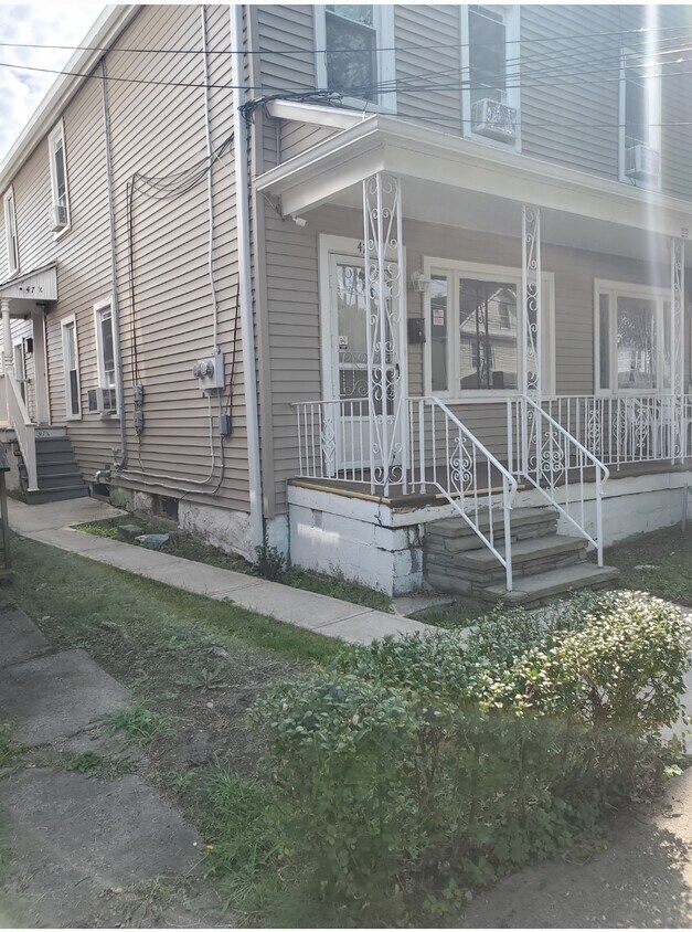 First floor apartment front and rear entrances - 47 Pulaski St