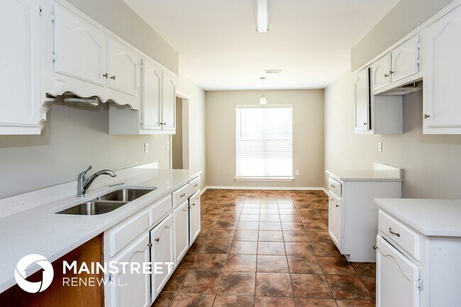 Foto del edificio - 7437 Cliffwood Dr