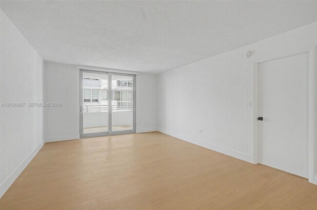 Building Photo - 5555 Collins Ave
