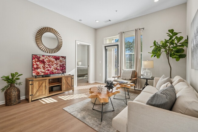 Living room with hard surface flooring - Avalon at Palisades
