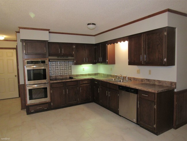 Building Photo - 4 br, 2.5 bath House - 7000 Loddon Cv