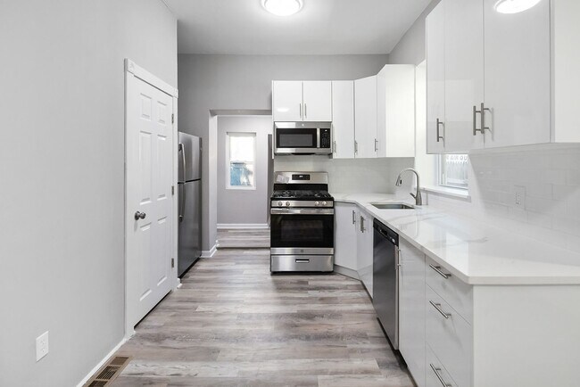 Photo - Renovated 4-Bedroom Home with Modern Finishes