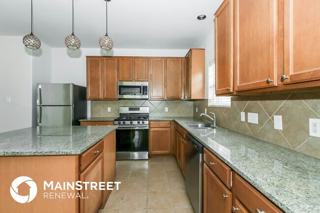 Foto del edificio - 8515 Satinwood Way