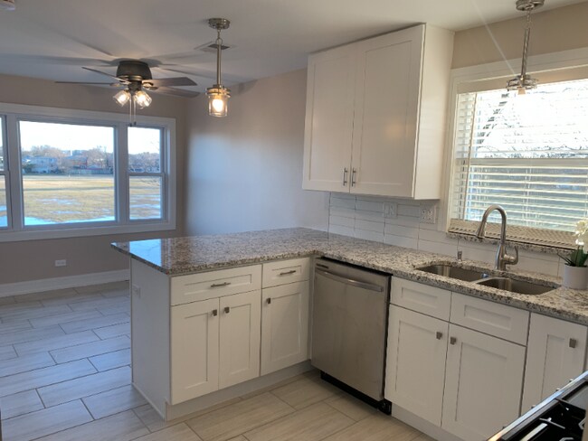 Building Photo - 8729 W 73rd Pl