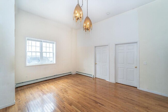 Foto del edificio - 411 John F. Kennedy Blvd