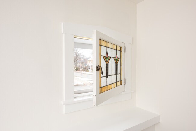 original stain glass window - 1044 Asbury Ave