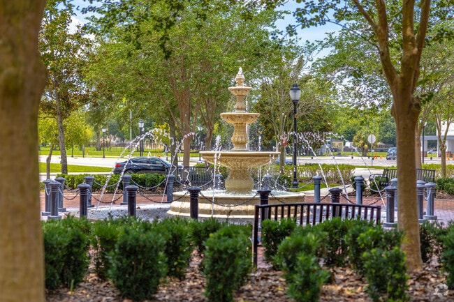 Shaded by trees and well manicured green space Village Green is a great pocket park.
