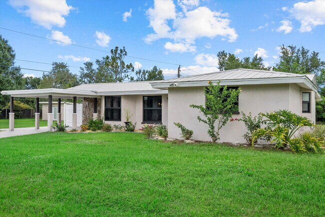 Building Photo - 3-Bedroom Punta Gorda Retreat with Marble ...