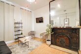Living Room Oversize Mirror Angle - 1818 Saint Paul St