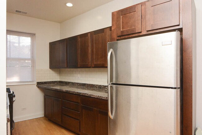 Foto del edificio - 1003 W Sunnyside Ave