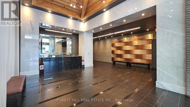 Photo du bâtiment - 210 Simcoe St