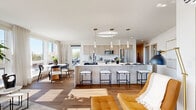Located in the heart of Kirkland, Washington, Unit 400 at 148 Lake St S is a well-appointed residence that masterfully blends modern design with stunning natural surroundings. The open-concept main living area seamlessly connects the kitchen, dining room, and living room, all bathed in abundant natural light streaming through expansive floor-to-ceiling windows that frame striking views of Lake Washington.

The kitchen serves as a central showpiece, featuring a generous waterfall-edge island with bar seating, light wood cabinetry, a marble-inspired tile backsplash, stainless steel appliances, and elegant pendant lighting overhead. Wide-plank hardwood flooring flows continuously throughout the space, enhancing its warm, cohesive aesthetic.

The living room opens to a private balcony with glass railings, offering outdoor seating with views of the surrounding Kirkland streetscape. The spacious primary bedroom includes a walk-in closet and an en-suite bathroom outfitted with a frameless glass-enclosed shower and light wood vanity cabinetry. A dedicated office provides a quiet, functional workspace. The second bathroom mirrors the refined finishes found throughout. A separate dining area completes this thoughtfully arranged, light-filled residence.