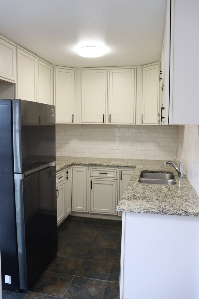 Fridge, freezer, sink & dishwasher. Lots of space for food & kitchen equipment. - 6396 E Mississippi Ave (Denver, CO) Apartment