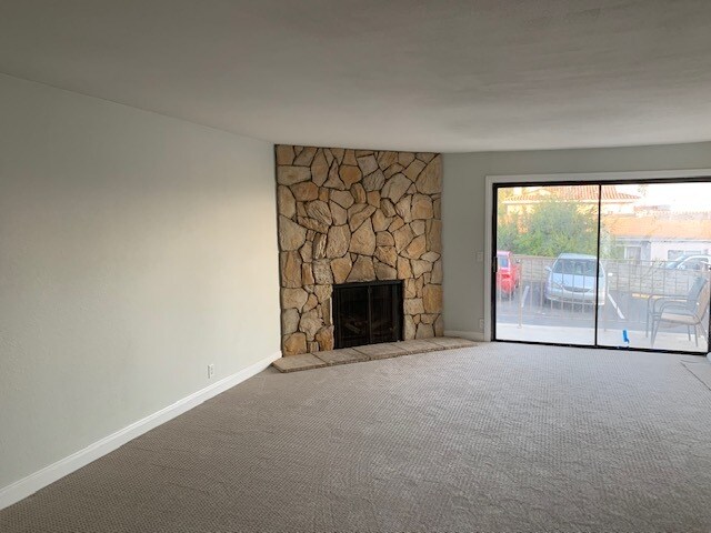 Living Room Cozy Fireplace - 2501 S El Camino Real