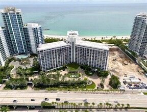 Building Photo - 10275 Collins Ave