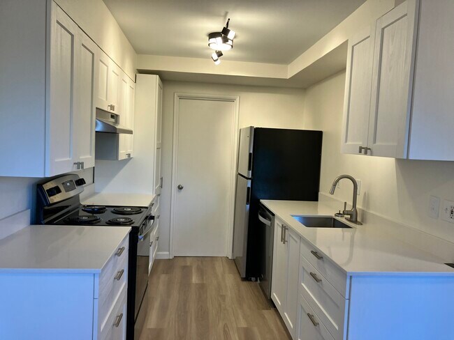 Kitchen with new counters, cupboards, and appliances - 3022 SW 12th Ave