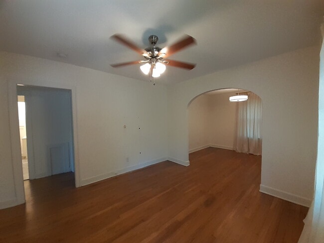 Building Photo - "Charming 2-Bedroom Duplex with Hardwood F...