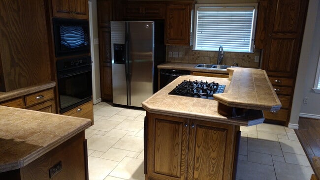 Building Photo - 3/2/2 open space concept in Tech Terrace.Large backyard