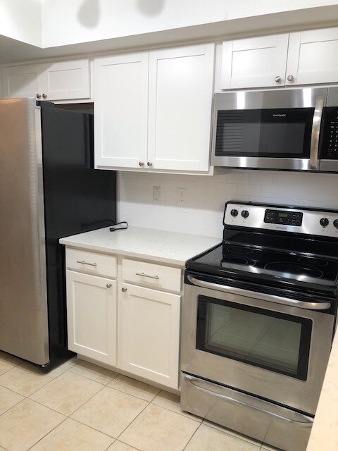 Kitchen - brand new cabinets and appliances - 1801 E Lake Rd