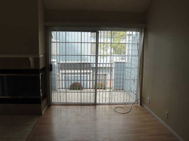 Building Photo - Open and Airy Condo at Country Club Villag...