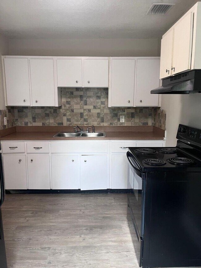 Building Photo - Updated and Spacious Clean Home, Available...