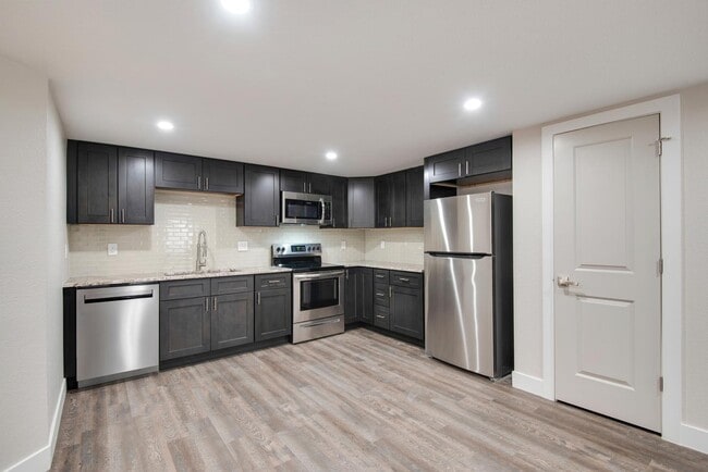 Photo - Newly remodeled basement apartment close t...