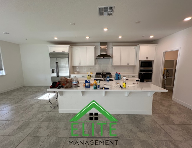 Building Photo - Spacious 5-Bedroom Home with Private In-La...