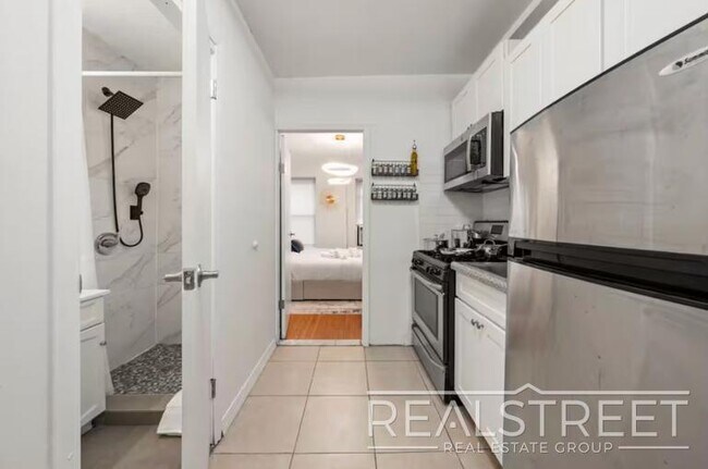 Foto del edificio - Modern 2BR/2BA in Prime Chinatown | Quick Access to Midtown & Google HQ