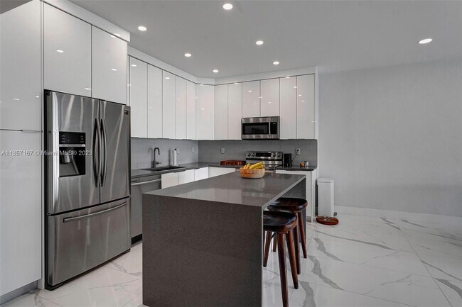 Building Photo - 19390 Collins Ave