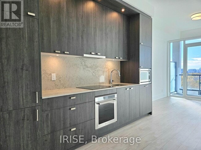 Photo du bâtiment - 115 Denison Ave