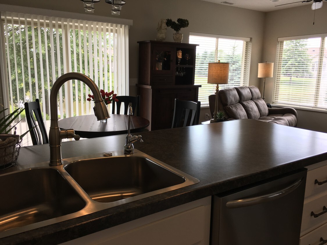 kitchen sink area looking onto the living rm - 901 Pine Ridge Pkwy NW