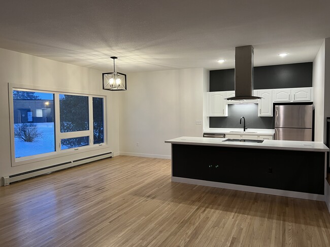 Unit B Living Dining and Kitchen - 207 6th St