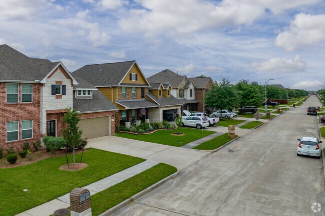 The suburbs of Deer Park are known for their impeccably manicured lawns.