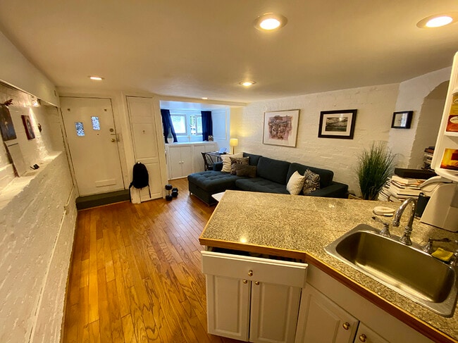 Living room area with kitchenette counter top - 3118 1/2 Dumbarton St NW