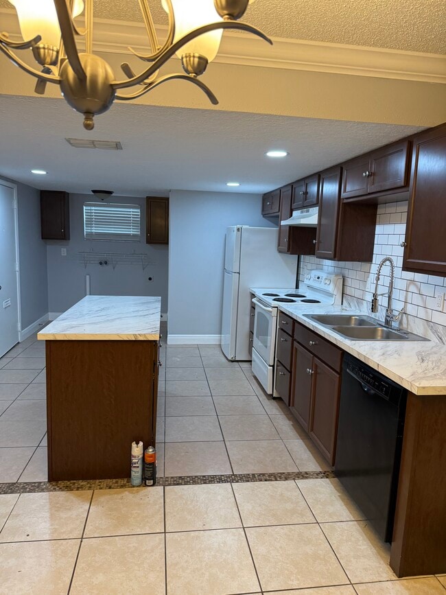 Spacious kitchen with island - 7261 Pond Cir