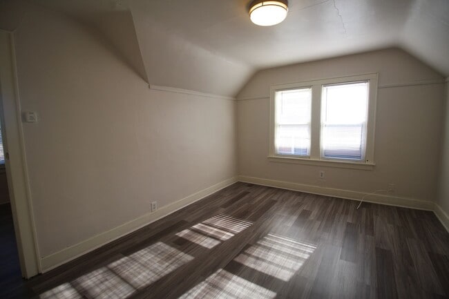 Building Photo - Welcome Home to this Sunny Upper Unit 1 Bd...