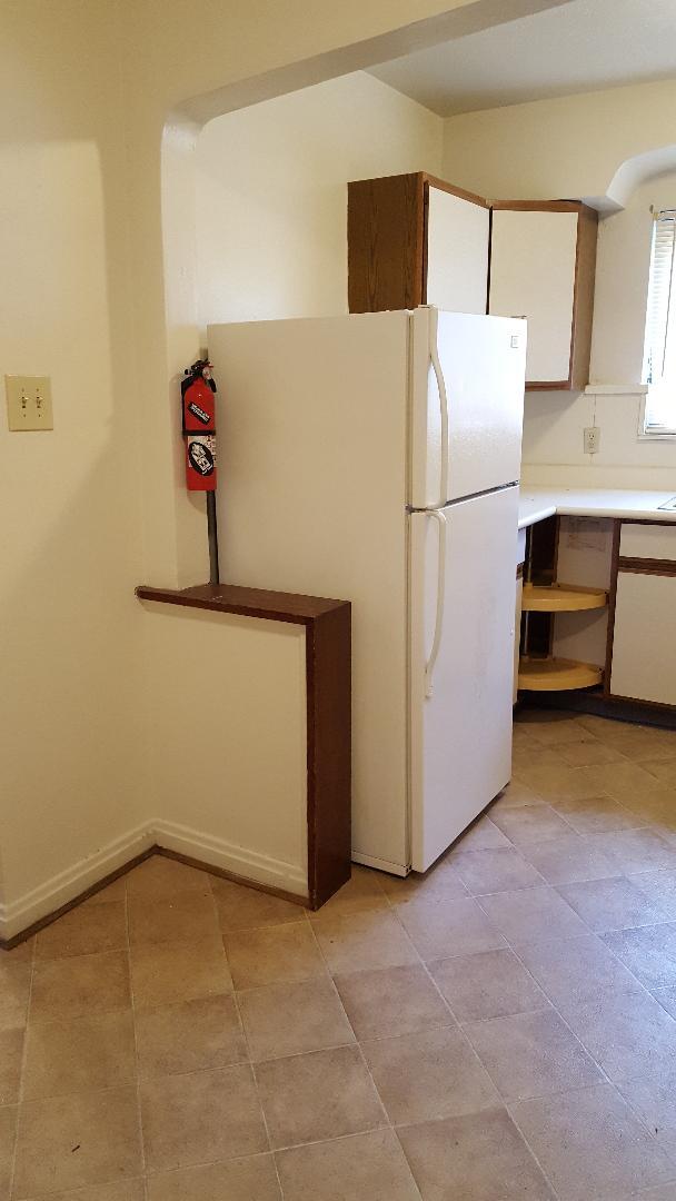 Kitchen with Refrigerator - 4525 Roth Ave