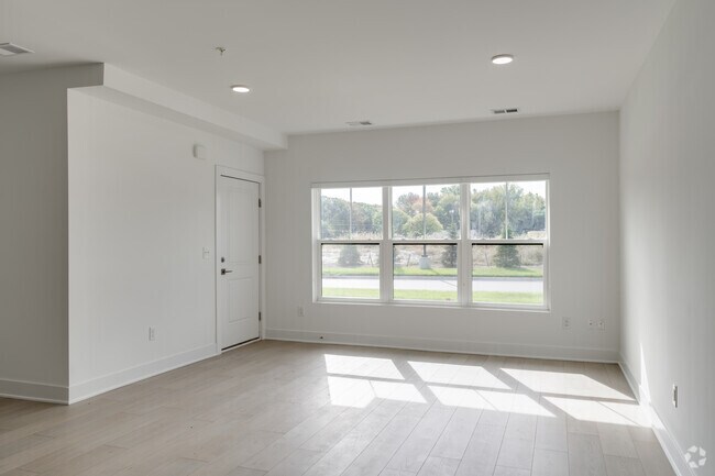 2 habitaciones, 2 baños - 1029 pies cuadrados - The Avalon - Sala de estar - The Enclave