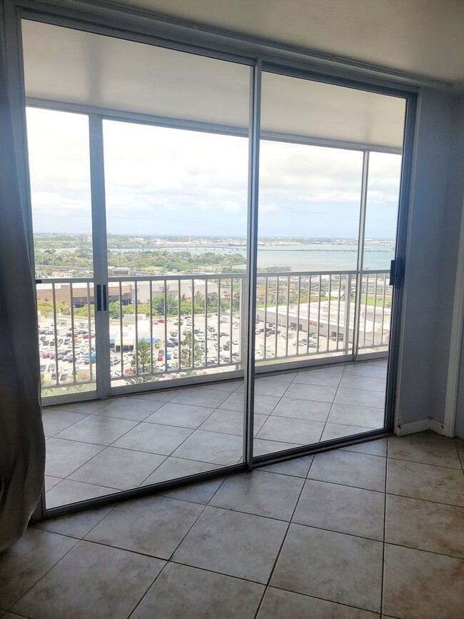 Building Photo - AVAILABLE | 2 Bedroom, 1 Bathroom Condo with 1 Assigned Parking Stall