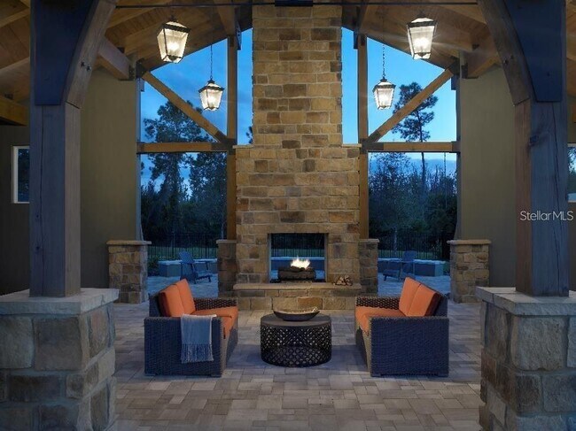 Community has a cozy fireplace area. - 8907 Frodsham Way