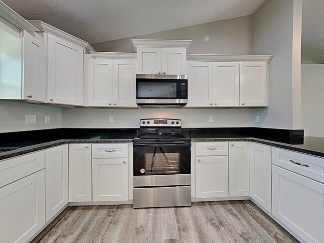 Building Photo - 10465 N Spaulding Dr