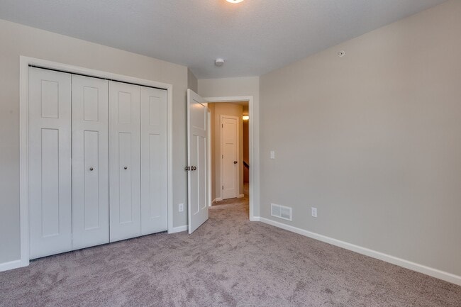 Building Photo - lease in Zimmerman:  3bd 2ba 2car garage townhome