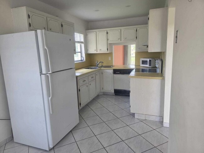 Building Photo - 5750 NW 64th Ave