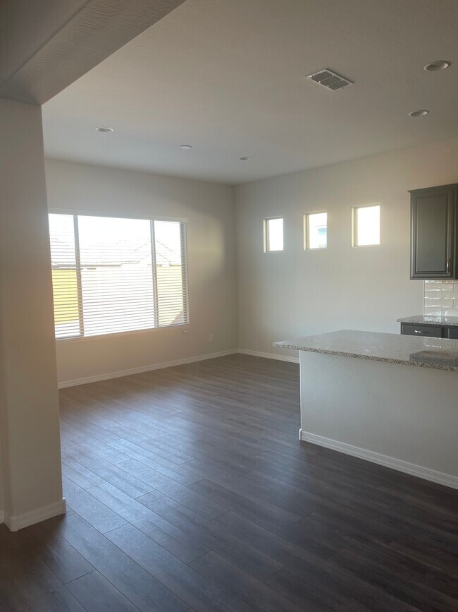 into the kitchen/dining - 27414 W Sierra Pinta Dr