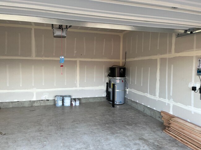 Building Photo - New Construction! Four Bedroom Home in Woo...