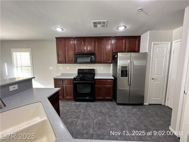 Foto del edificio - UPGRADED HENDERSON HOME IN GATED COMMUNITY!!