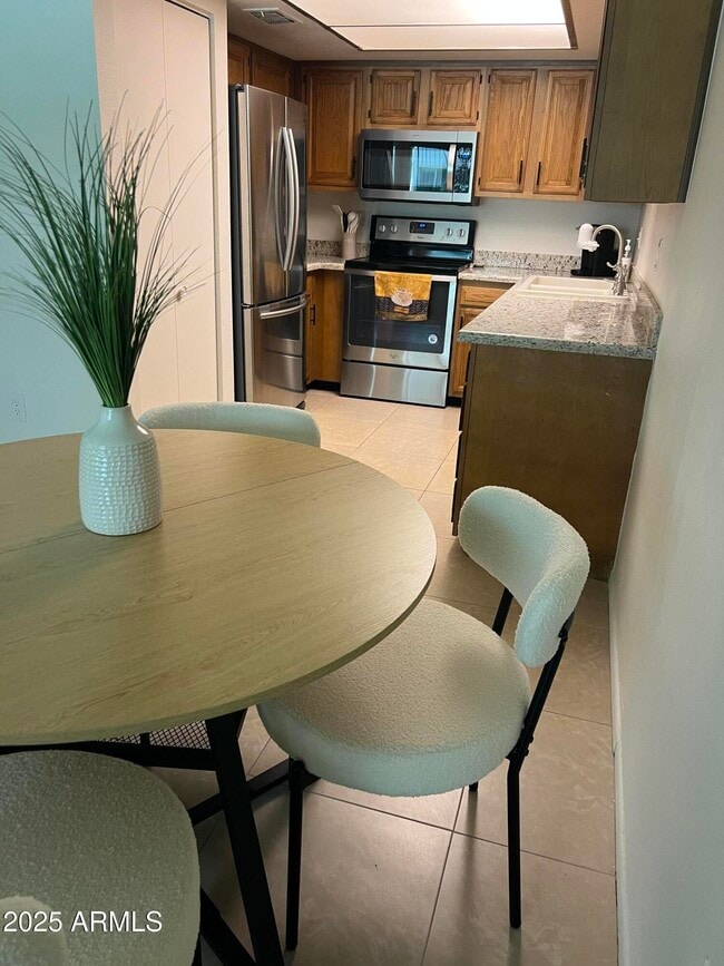 Building Photo - 7950 E Camelback Rd